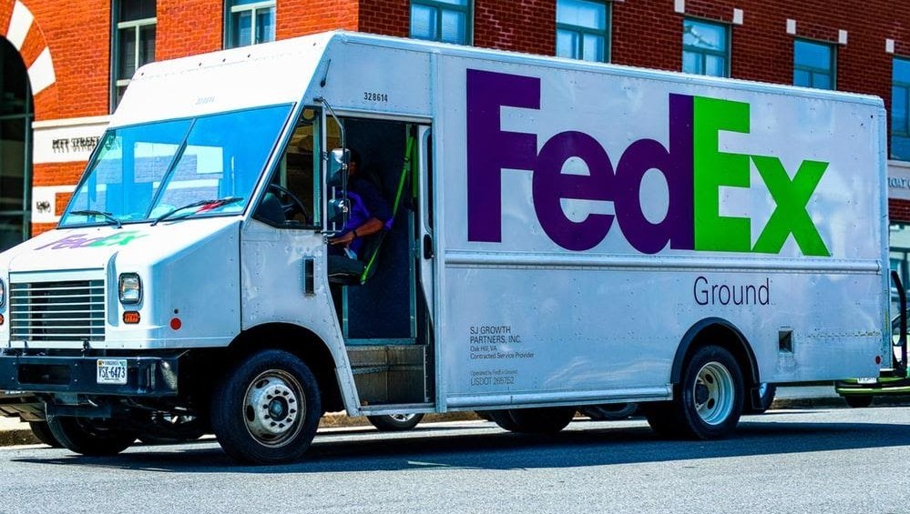 fed ex logo with meaning