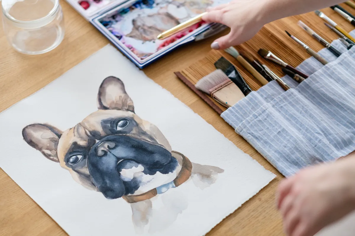 painting of bulldog with brushes