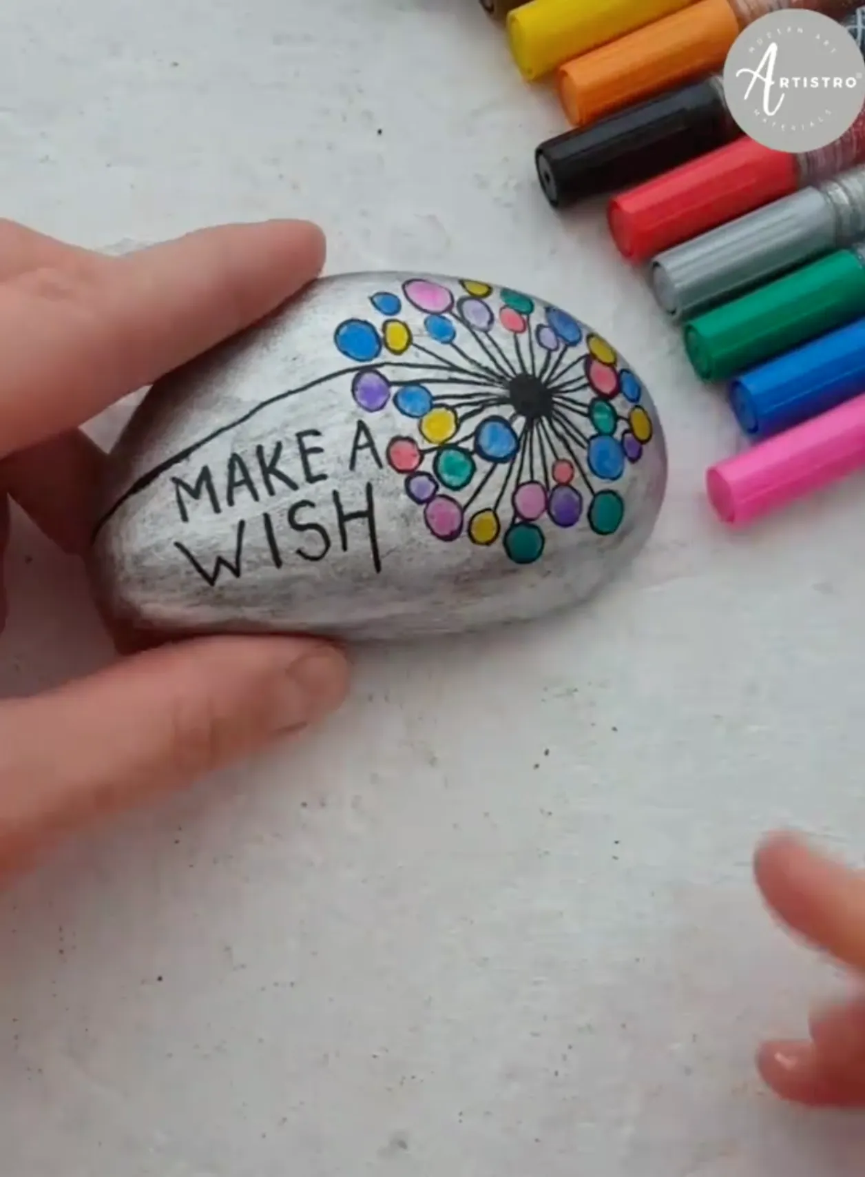 rock painting with acrylic pens